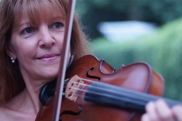 Christine playing violin closeup